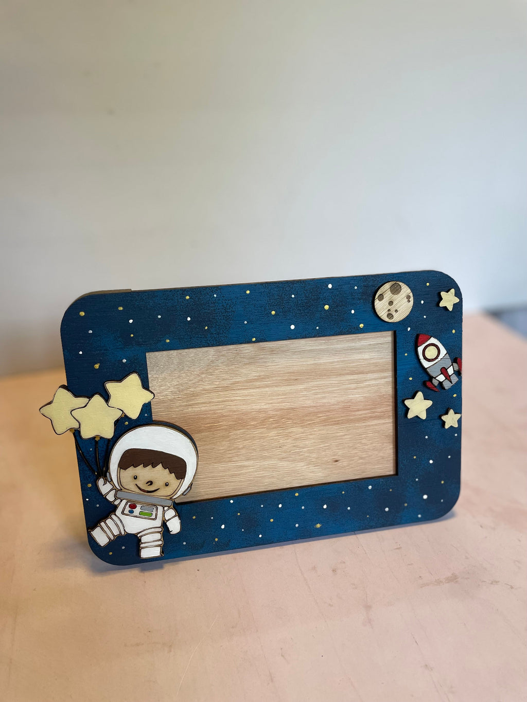 Porta retrato de astronauta