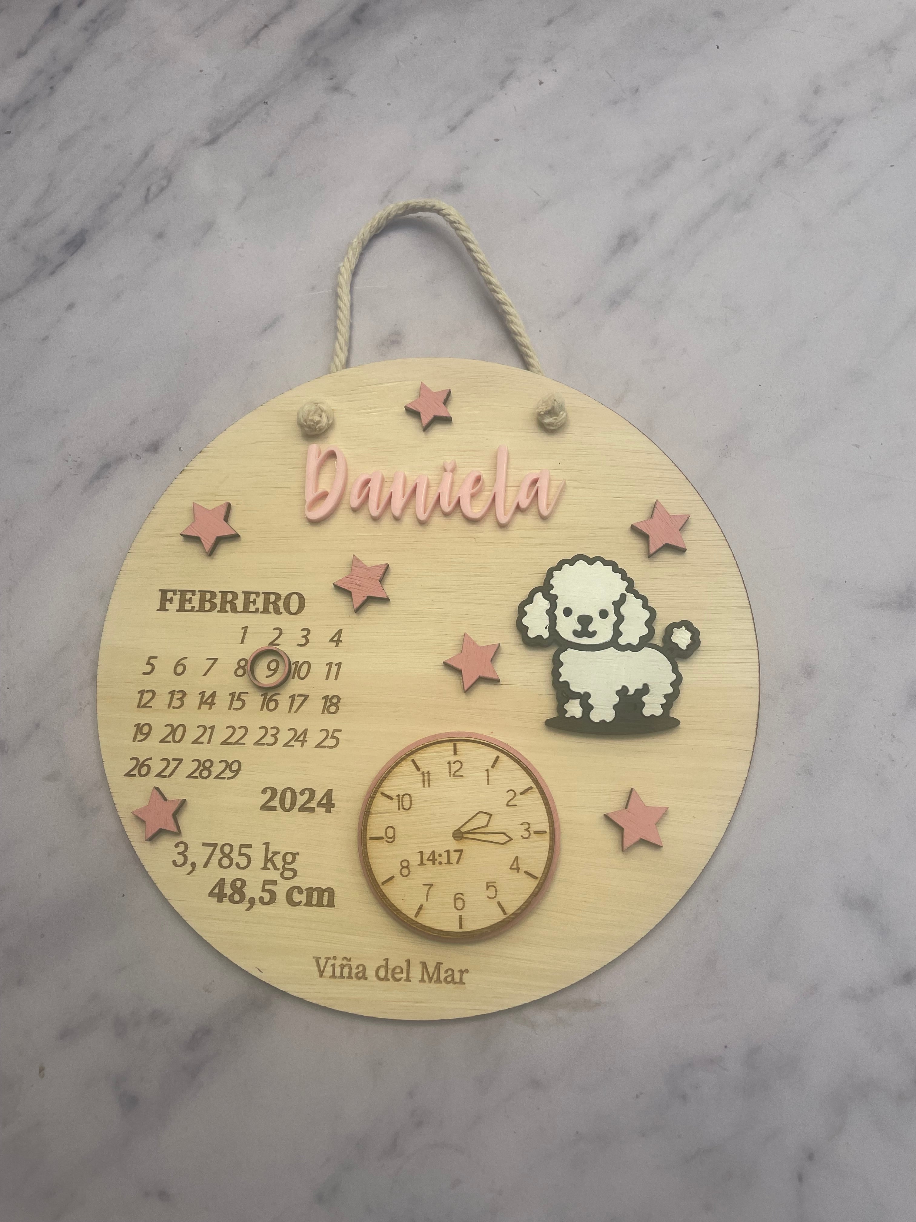 Cartel de nacimiento con poodle