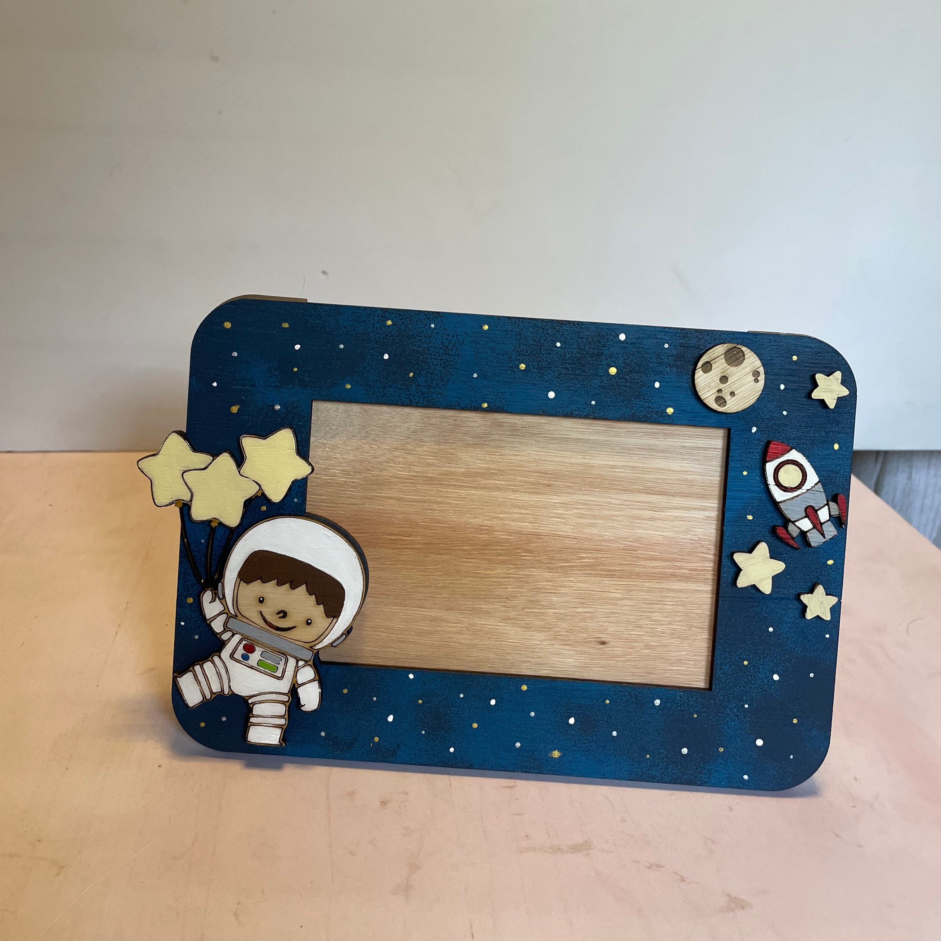 Porta retrato de astronauta